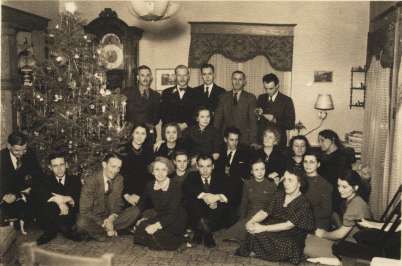 photo of group with Christmas tree